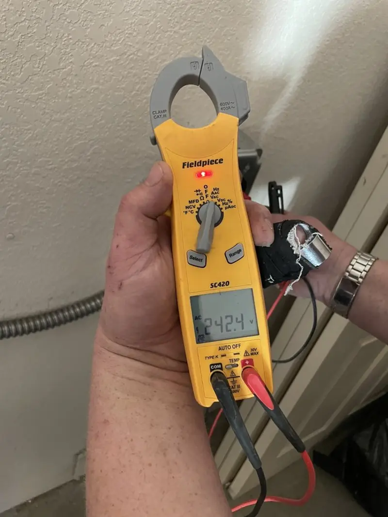Voltage testing with clamp meter during Generator Installation in Sacramento